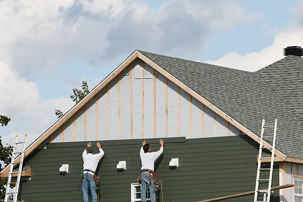 Professional Siding Contractor technician working in Roselle, NJ
